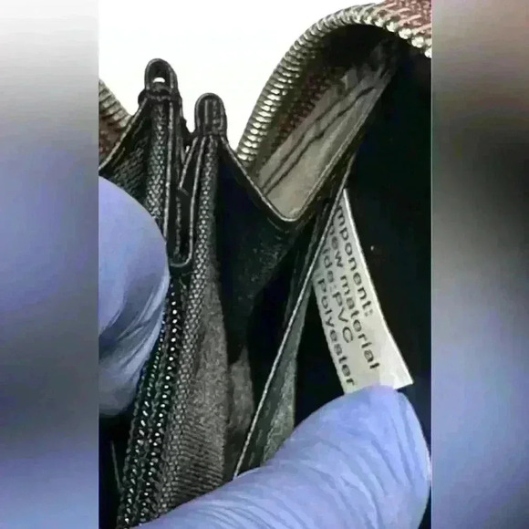 A woman’s brown wallet with ostrich leather print type pattern. - Picture 9 of 12